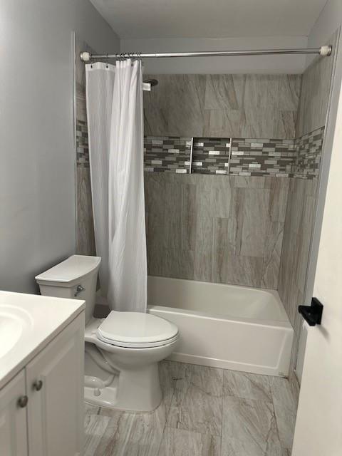 4151 Eastridge Circle Deerfield Beach, FL 33064 - Photo 26 of 53 a bathroom with a toilet and a shower