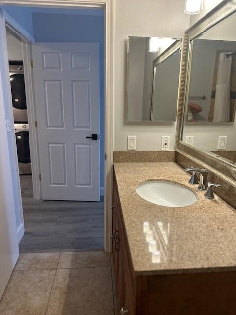 4151 Eastridge Circle Deerfield Beach, FL 33064 - Photo 30 of 53 a bathroom with a granite countertop sink and a mirror