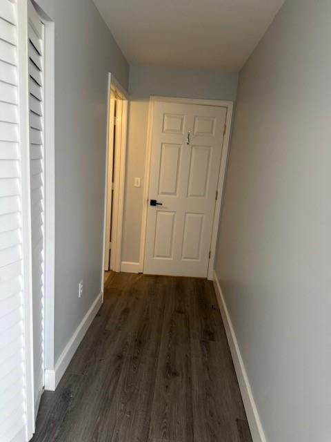 4151 Eastridge Circle Deerfield Beach, FL 33064 - Photo 32 of 53 a view of a small space with wooden floor and a window