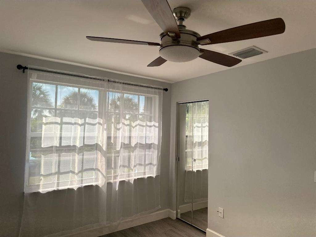 4151 Eastridge Circle Deerfield Beach, FL 33064 - Photo 38 of 53 a view of an empty room with a window