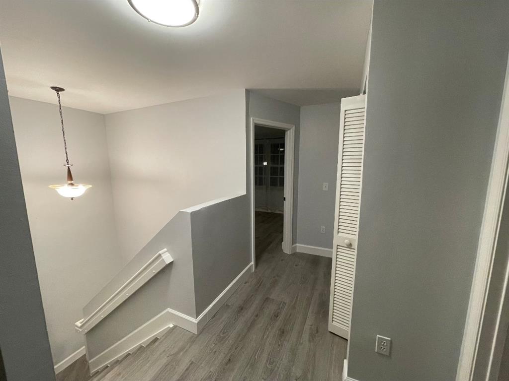 4151 Eastridge Circle Deerfield Beach, FL 33064 - Photo 42 of 53 a view of a room with wooden floor