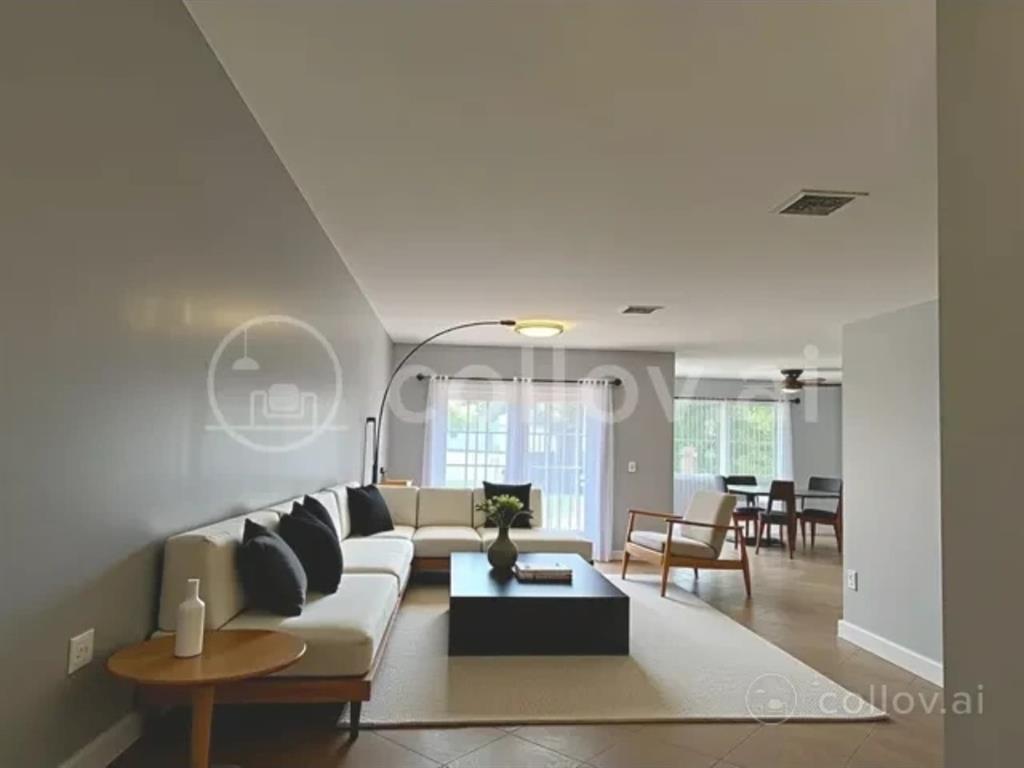 4151 Eastridge Circle Deerfield Beach, FL 33064 - Photo 47 of 53 a living room with furniture and a wooden floor