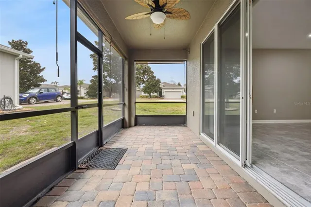 a view of a room with a large window