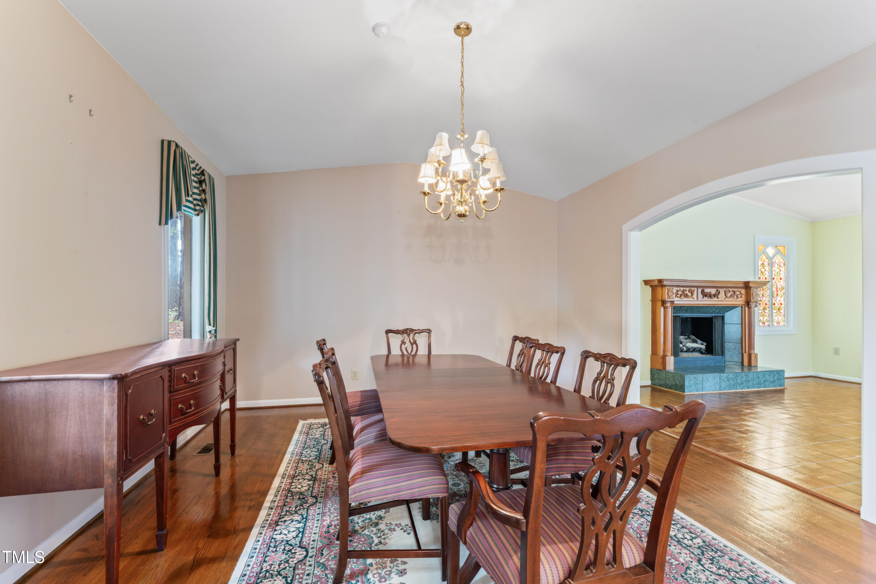 3872 Hope Valley Road Durham, NC 27707 - Photo 17 of 49 a view of a dining room with furniture and wooden floor