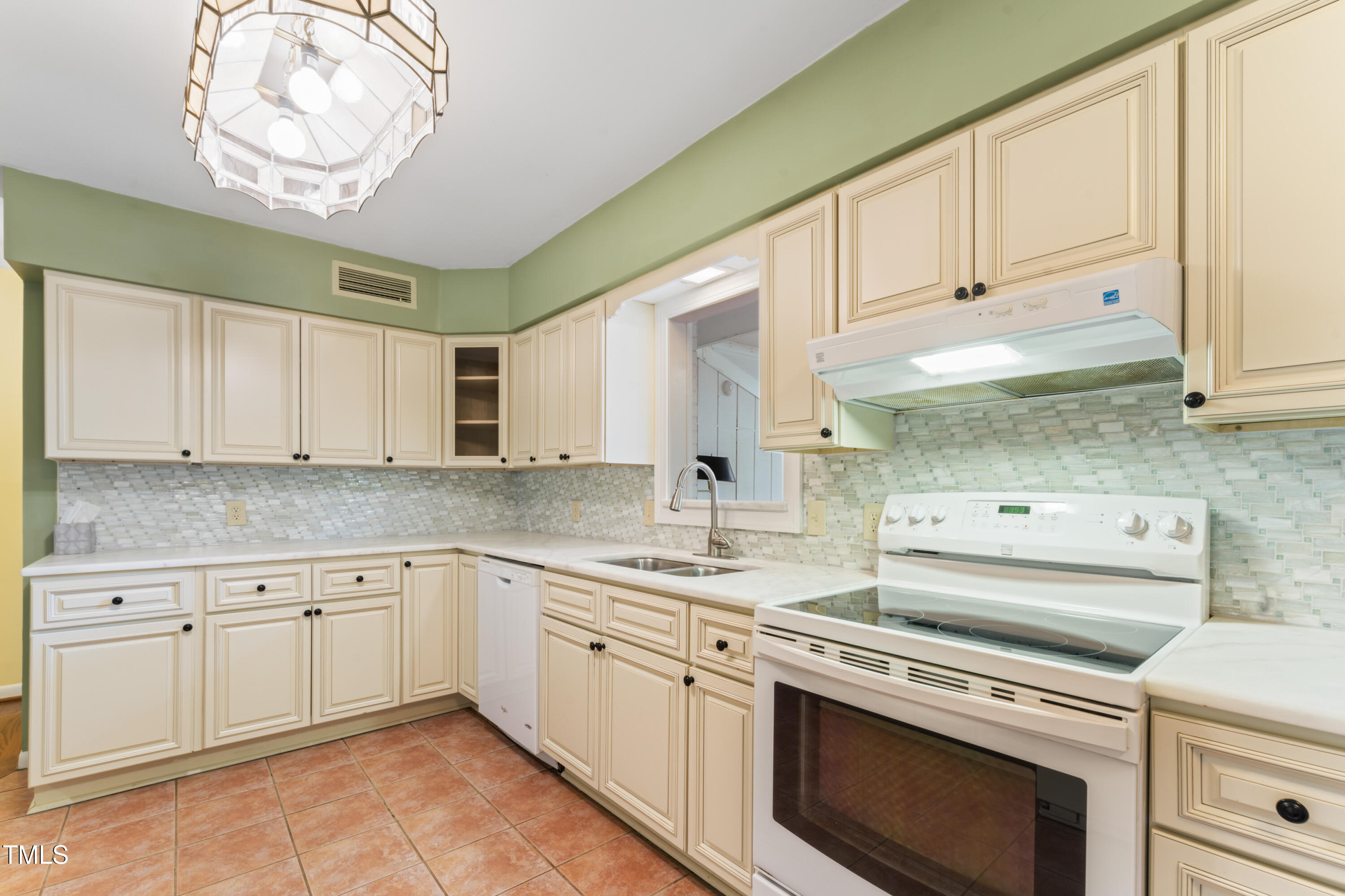 3872 Hope Valley Road Durham, NC 27707 - Photo 21 of 49 a kitchen with a sink and cabinets