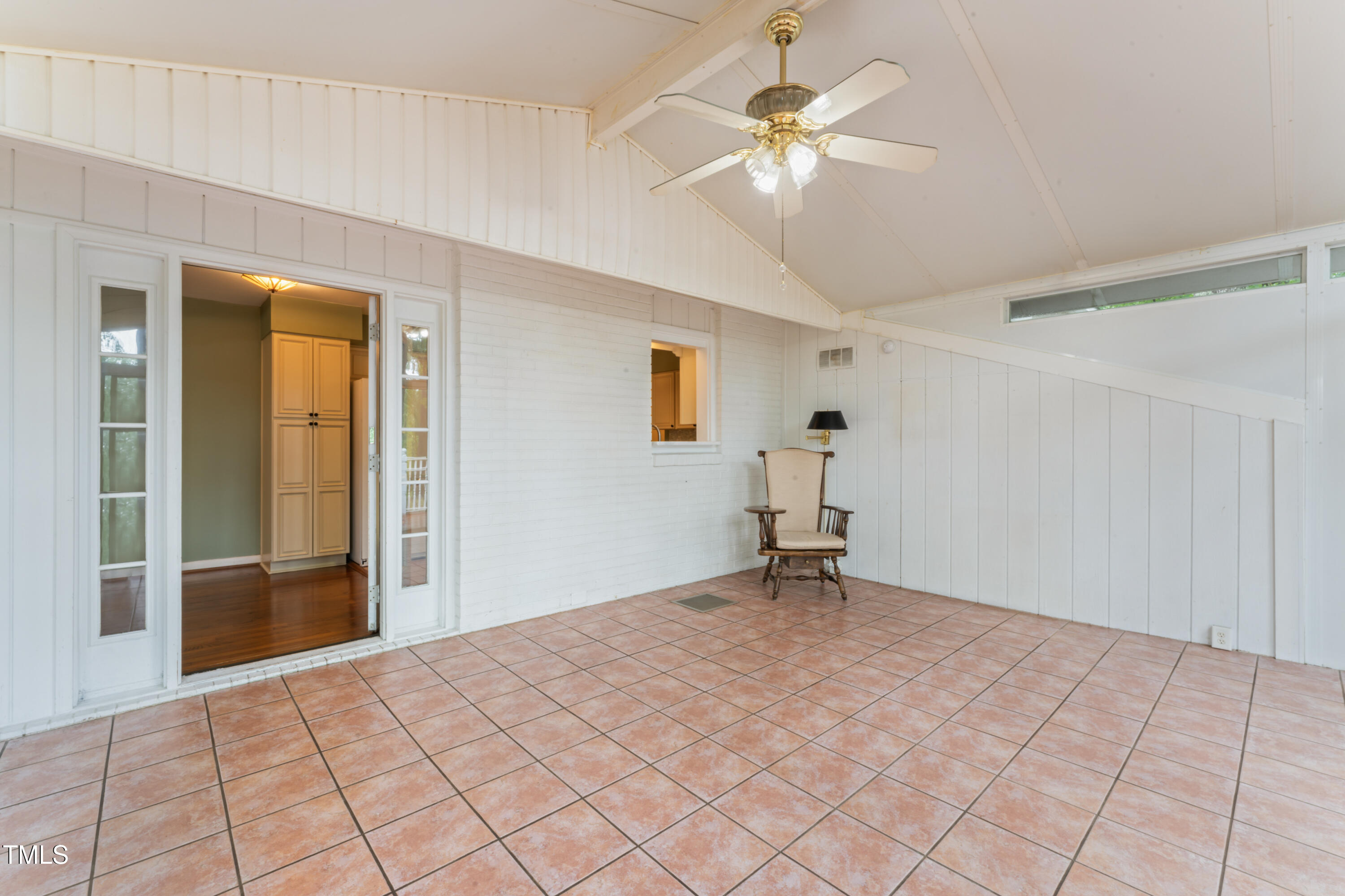 3872 Hope Valley Road Durham, NC 27707 - Photo 25 of 49 a view of an empty room with window and chandelier fan