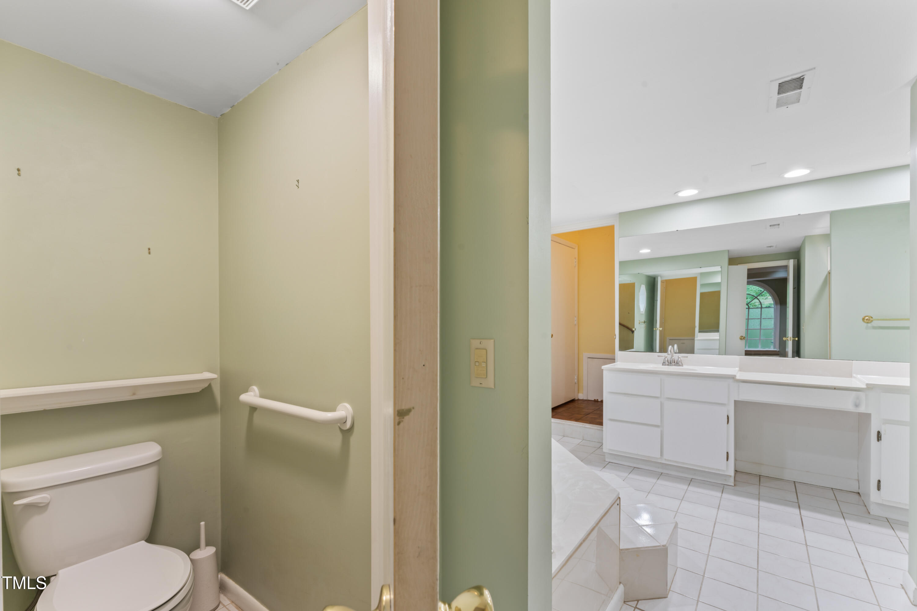 3872 Hope Valley Road Durham, NC 27707 - Photo 29 of 49 a bathroom with a sink a toilet and shower