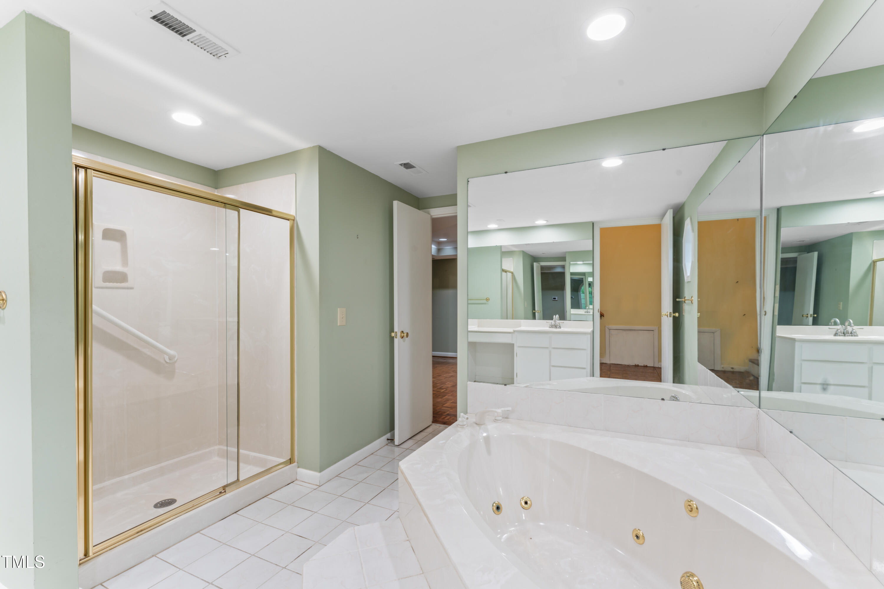 3872 Hope Valley Road Durham, NC 27707 - Photo 31 of 49 a bathroom with a bathtub and a shower