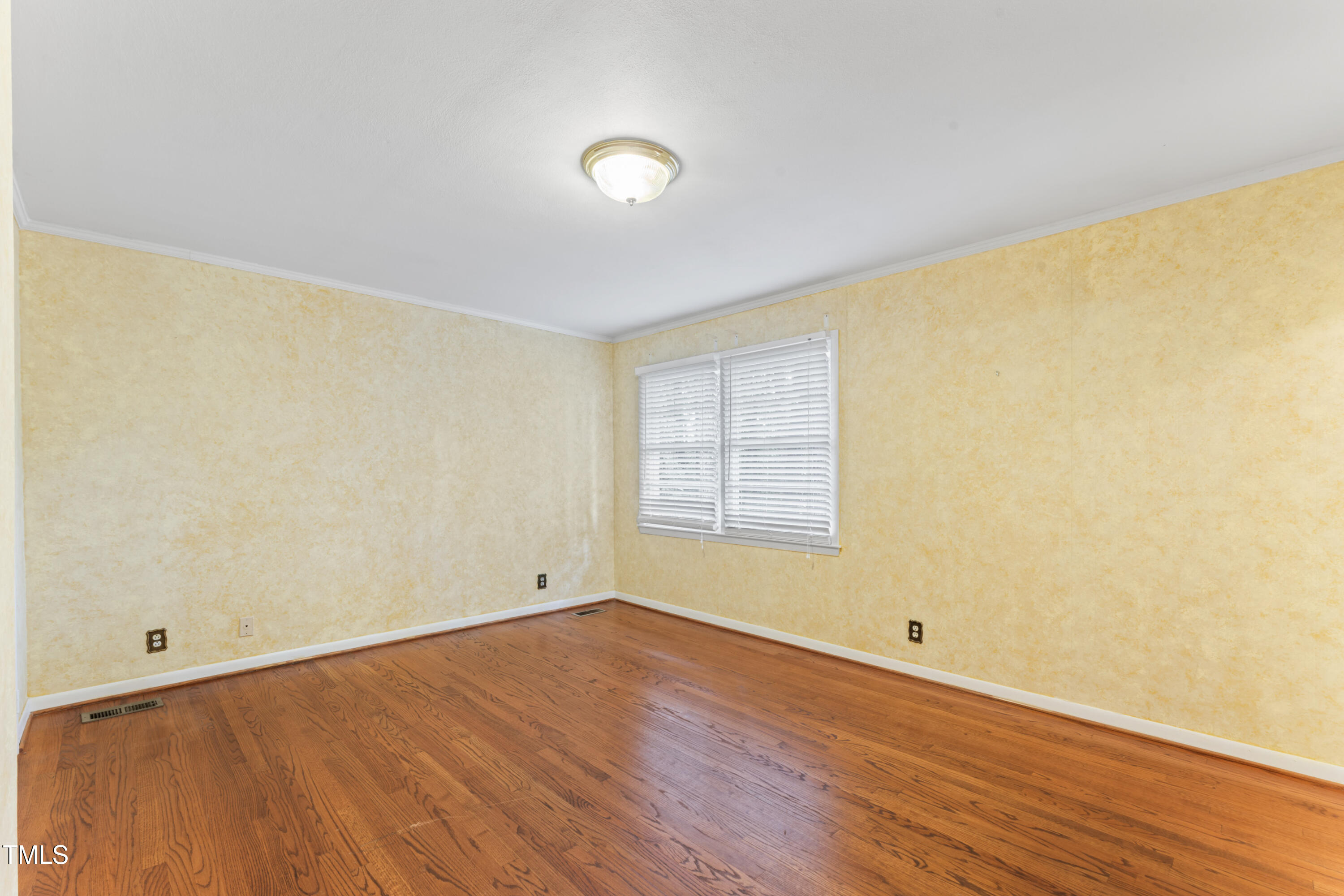 3872 Hope Valley Road Durham, NC 27707 - Photo 32 of 49 an empty room with wooden floor and windows