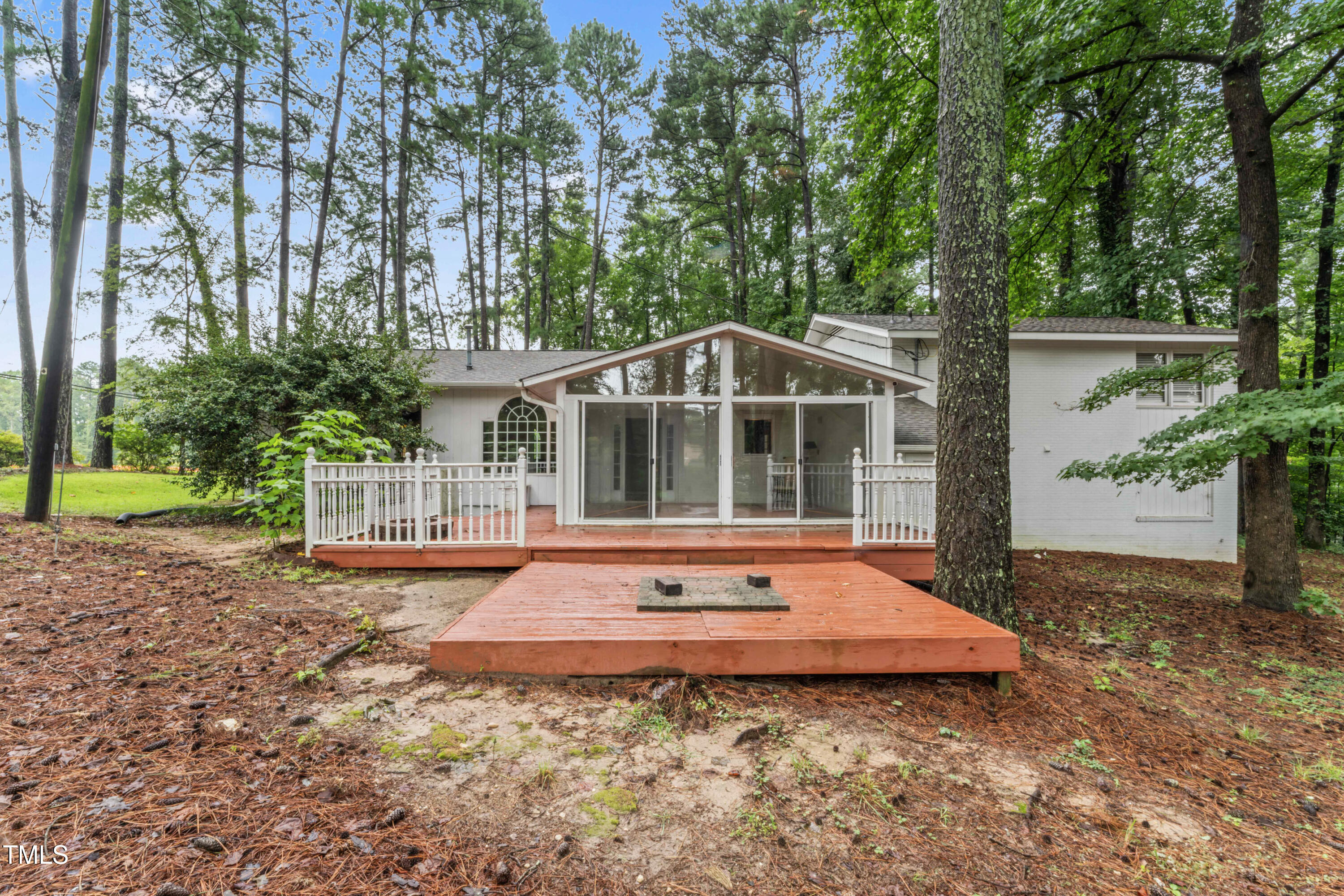 3872 Hope Valley Road Durham, NC 27707 - Photo 38 of 49 a view of a house with backyard sitting area and garden