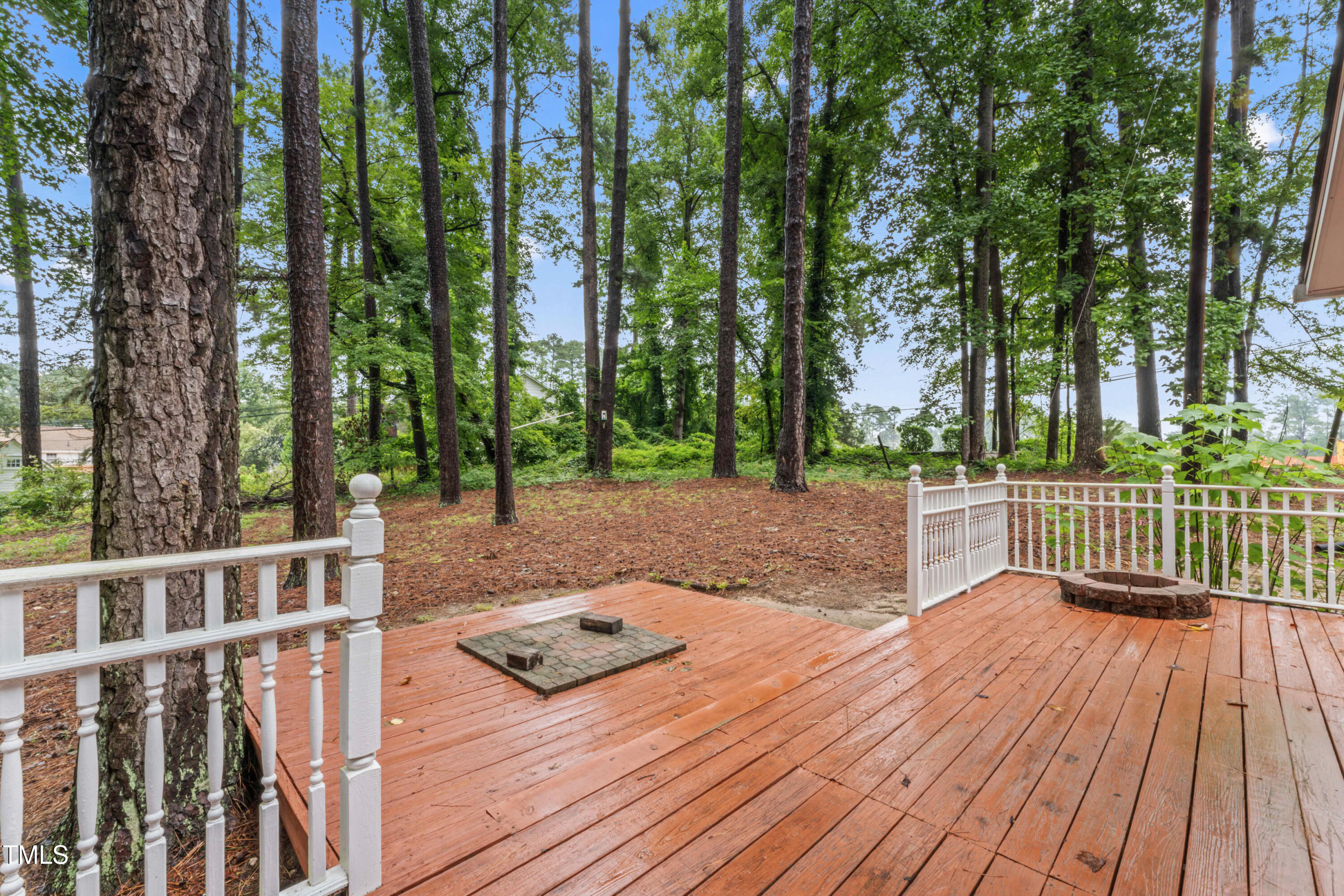 3872 Hope Valley Road Durham, NC 27707 - Photo 40 of 49 a view of backyard with a deck and wooden floor