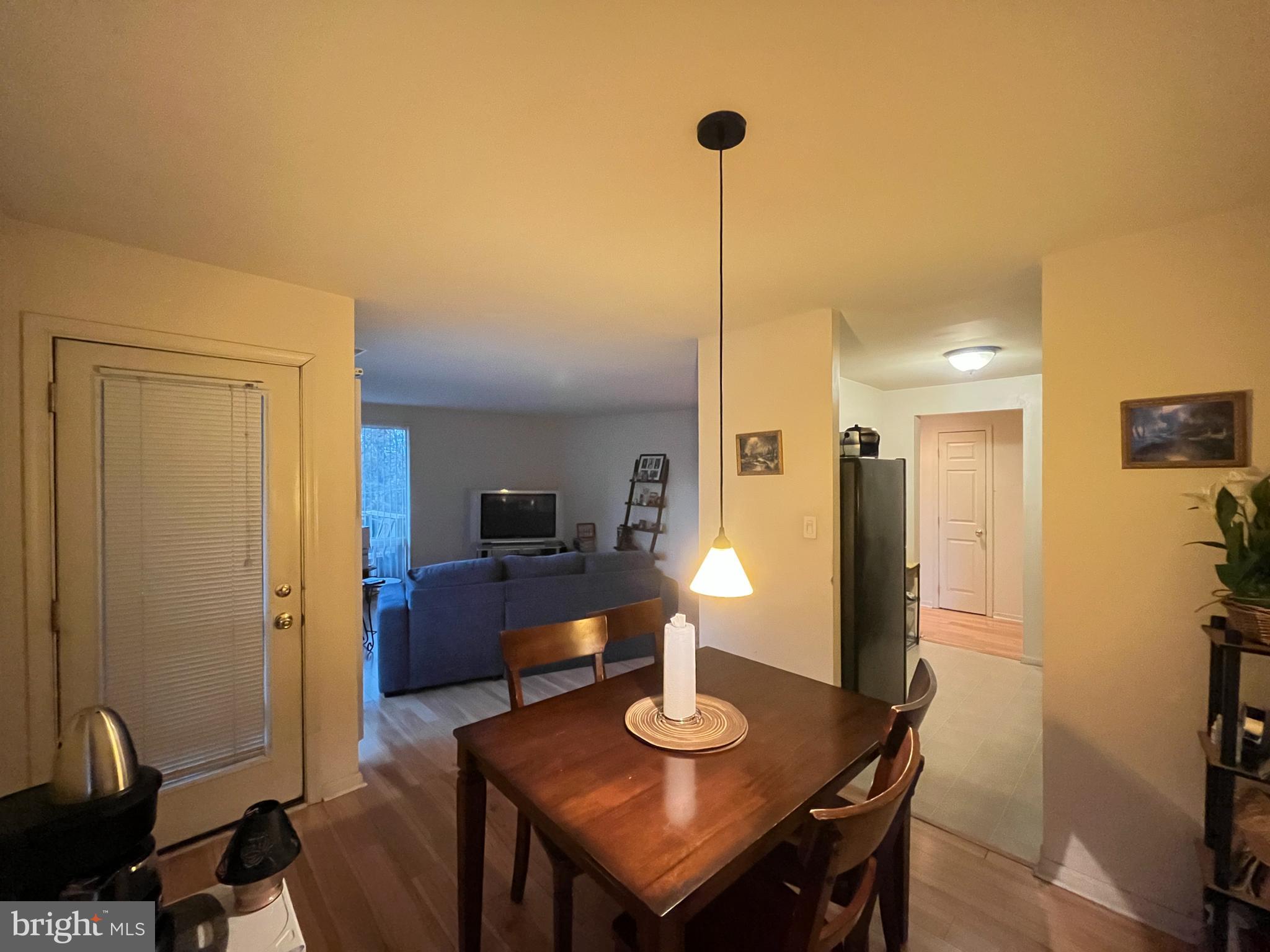 7101 Donnell Place, Unit D8 District Heights, MD 20747 - Photo 15 of 35 a view of a dining room with furniture