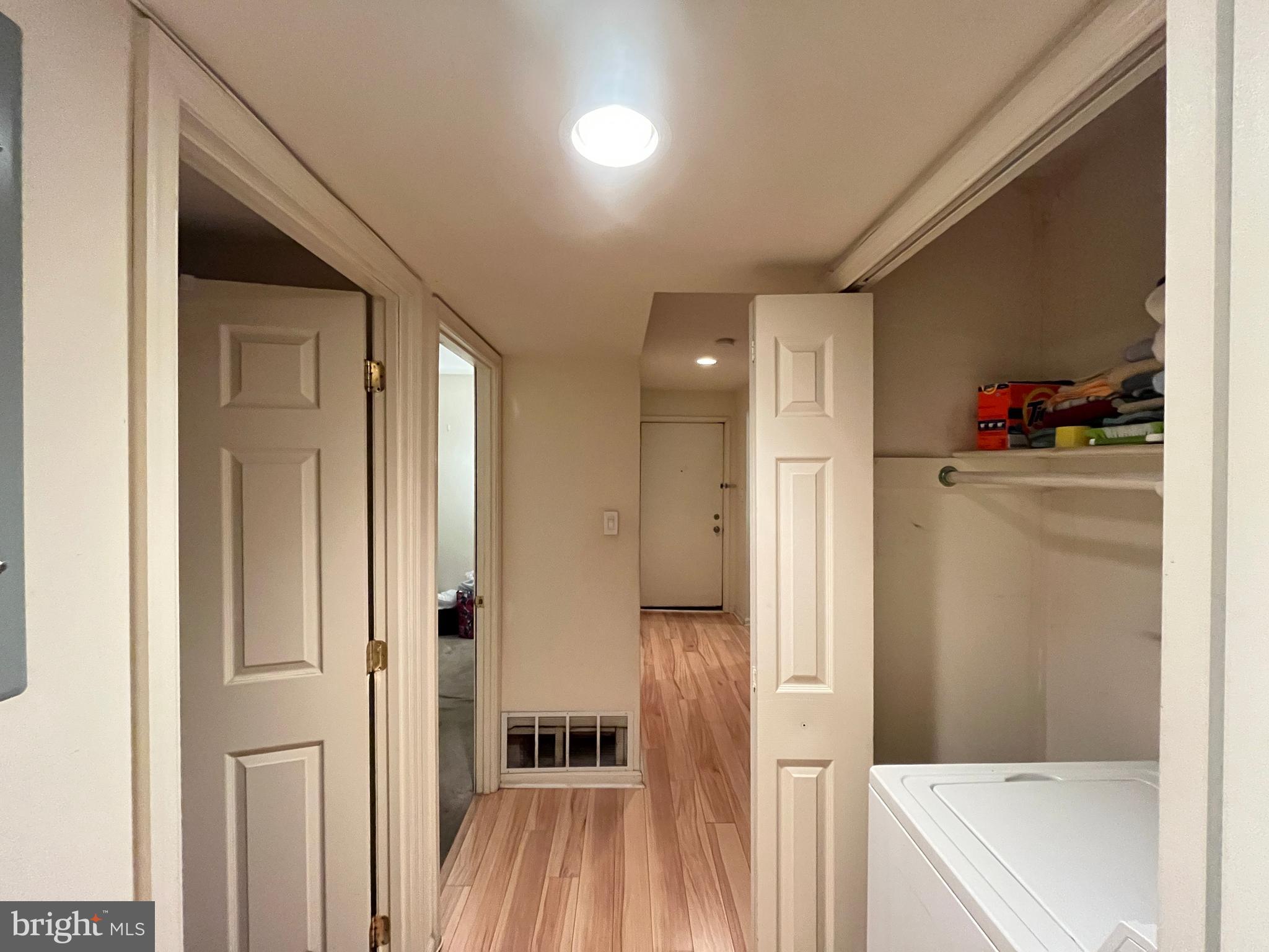 7101 Donnell Place, Unit D8 District Heights, MD 20747 - Photo 26 of 35 a bathroom with a tub shower and a sink