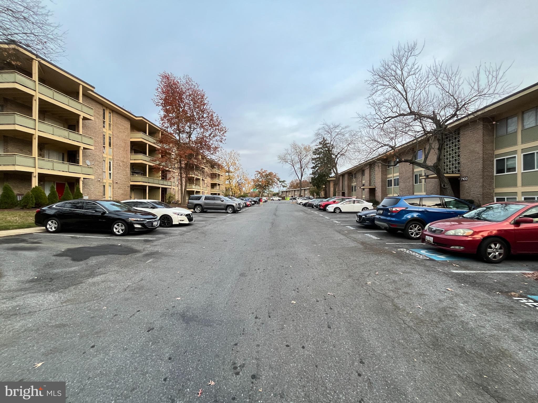 7101 Donnell Place, Unit D8 District Heights, MD 20747 - Photo 5 of 35 a cars parked in front of a building