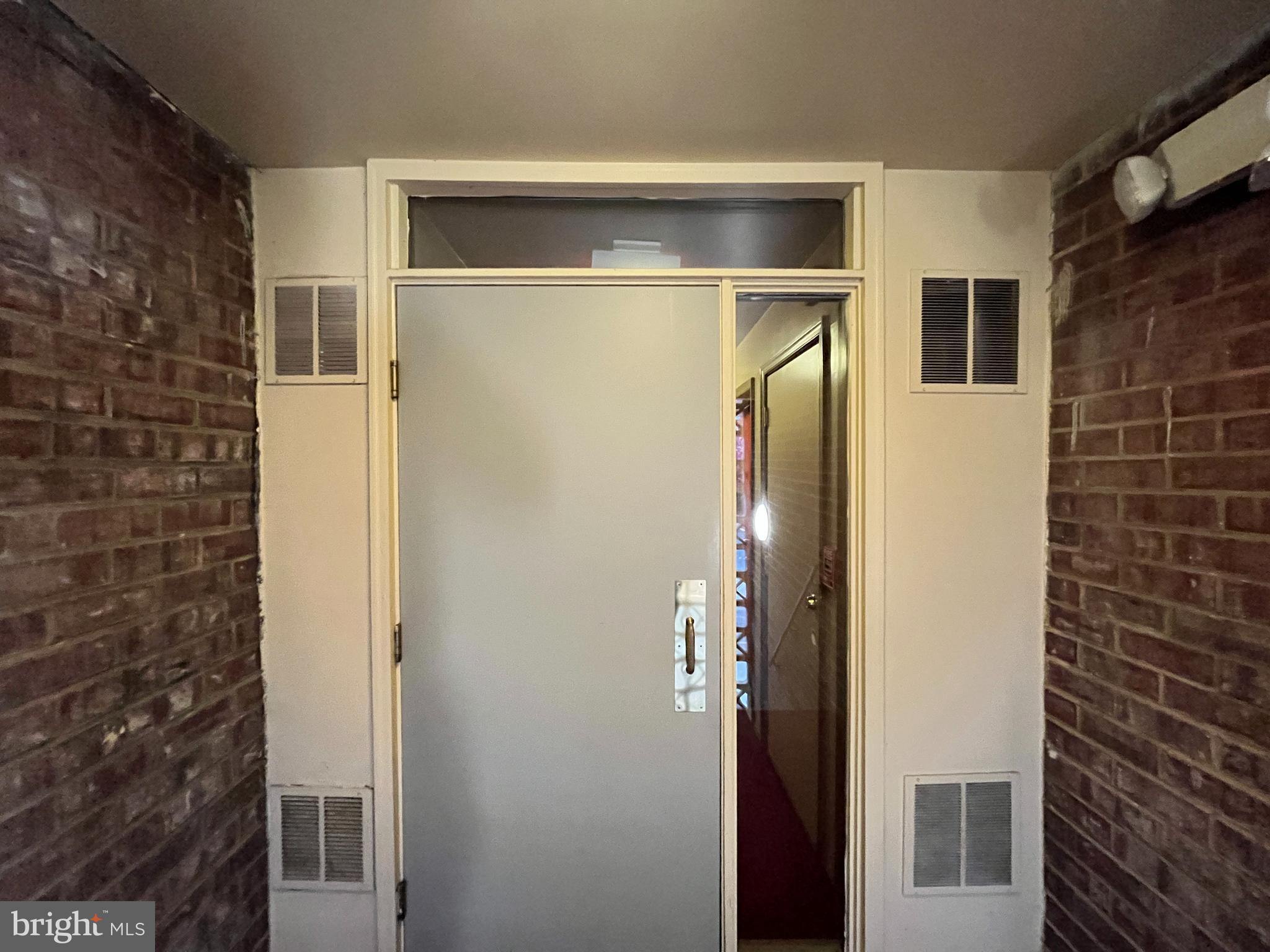 7101 Donnell Place, Unit D8 District Heights, MD 20747 - Photo 7 of 35 a bathroom with a shower and a door