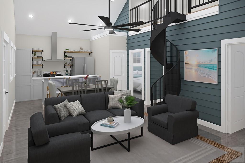 1045 Johnson Road, Unit 62 Gilchrist, TX 77617 - Photo 4 of 8 a living room with furniture and a chandelier