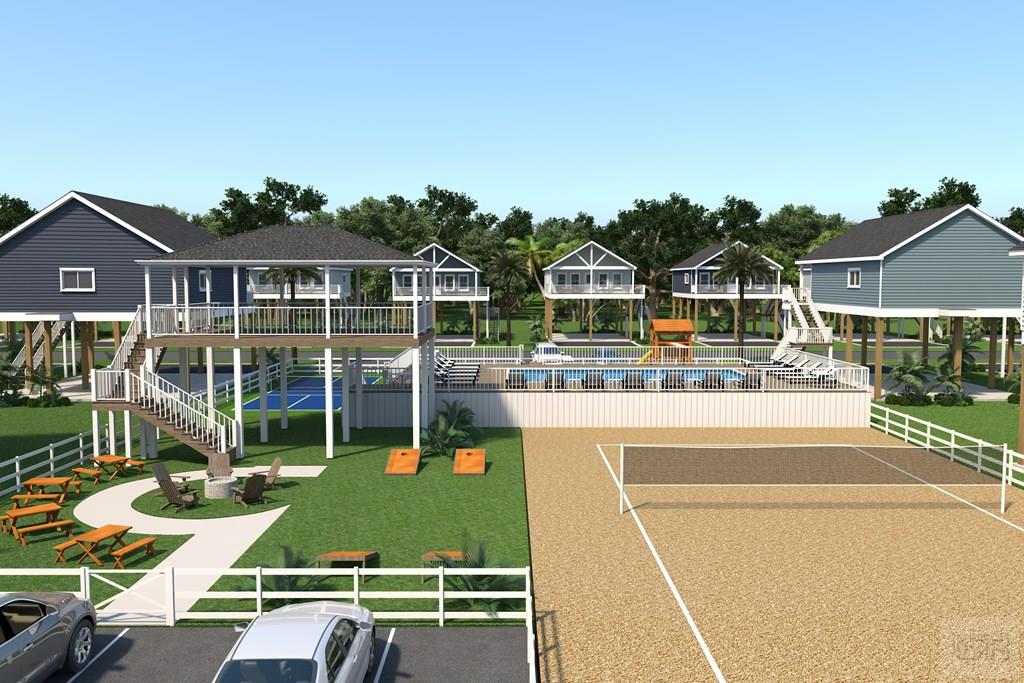 1045 Johnson Road, Unit 62 Gilchrist, TX 77617 - Photo 5 of 8 a view of a house with pool and chairs