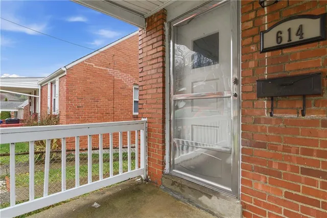 a view of a pathway with a balcony