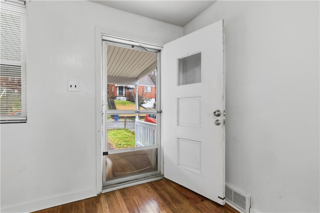 614 Ridgemont Drive Pittsburgh, PA 15220 - Photo 4 of 26 a view of hallway with wooden floor