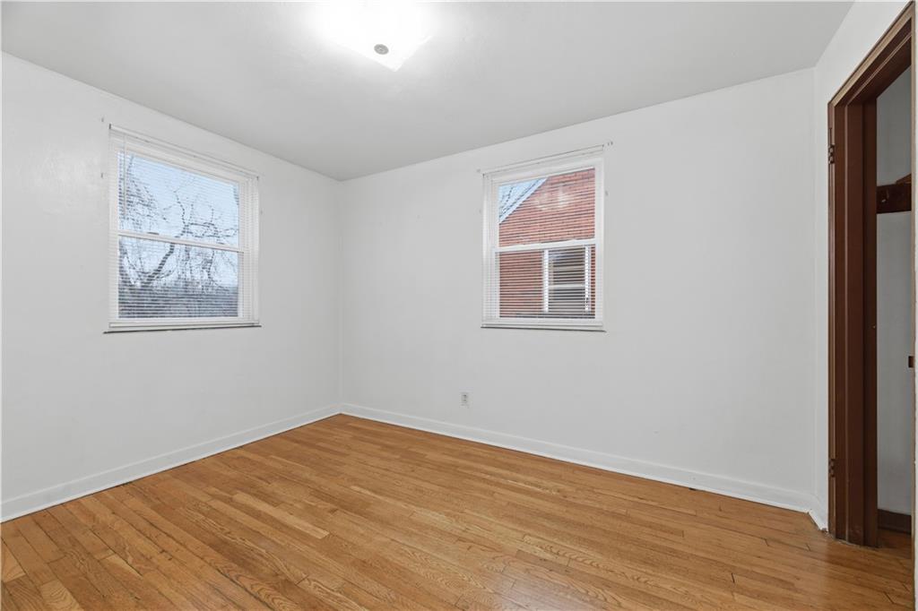 614 Ridgemont Drive Pittsburgh, PA 15220 - Photo 10 of 26 a view of empty room with wooden floor and fan