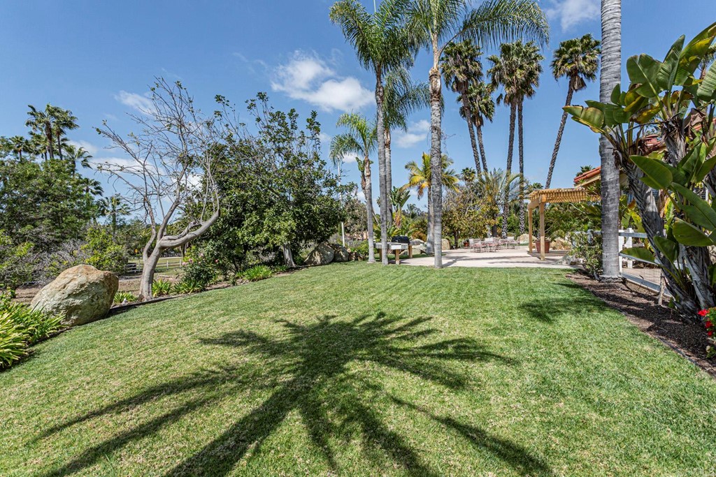 6944 Rancho Cielo Rancho Santa Fe, CA 92067 - Photo 25 of 37 a view of outdoor space with garden