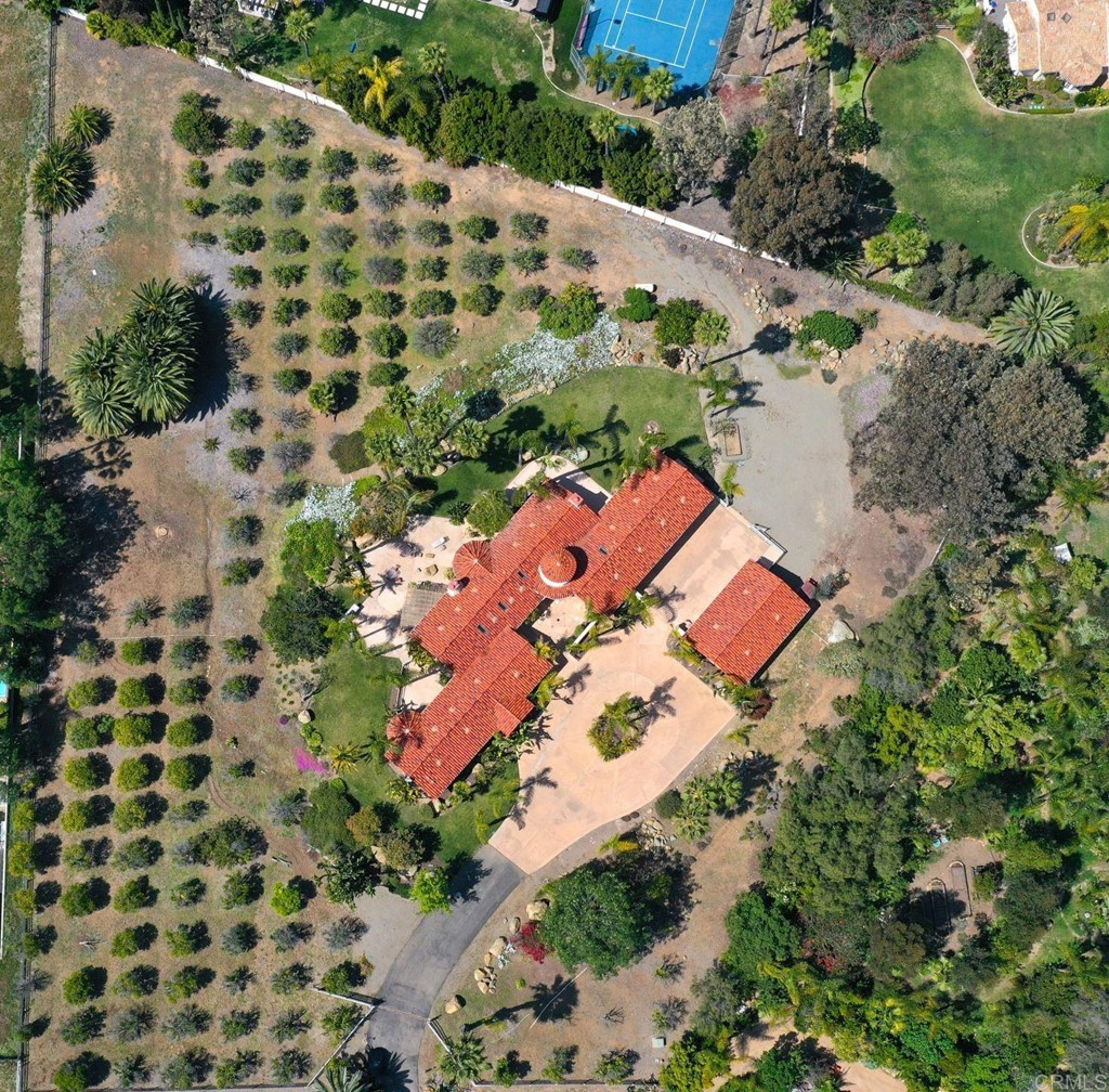 6944 Rancho Cielo Rancho Santa Fe, CA 92067 - Photo 36 of 37 an aerial view of house with yard