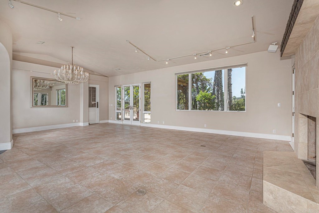 6944 Rancho Cielo Rancho Santa Fe, CA 92067 - Photo 5 of 37 a view of an empty room with a window