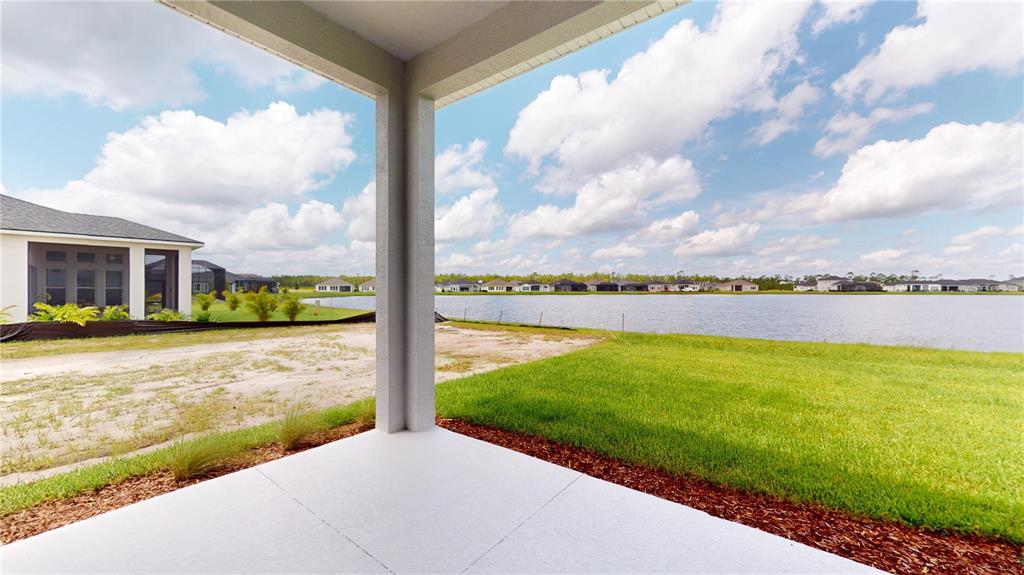 247 Azure Mist Way Daytona Beach, FL 32124 - Photo 30 of 40 a view of a street with an ocean view