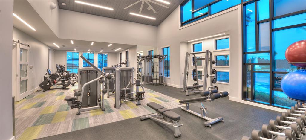 247 Azure Mist Way Daytona Beach, FL 32124 - Photo 36 of 40 a view of a room with gym equipment