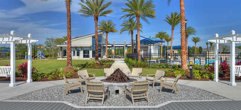 247 Azure Mist Way Daytona Beach, FL 32124 - Photo 38 of 40 a view of a house with backyard porch and sitting area