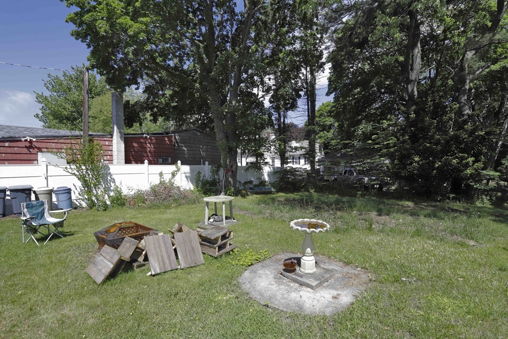 5 Anthony Street Acushnet, MA 02743 - Photo 7 of 37 a swimming pool with lots of green space and trees