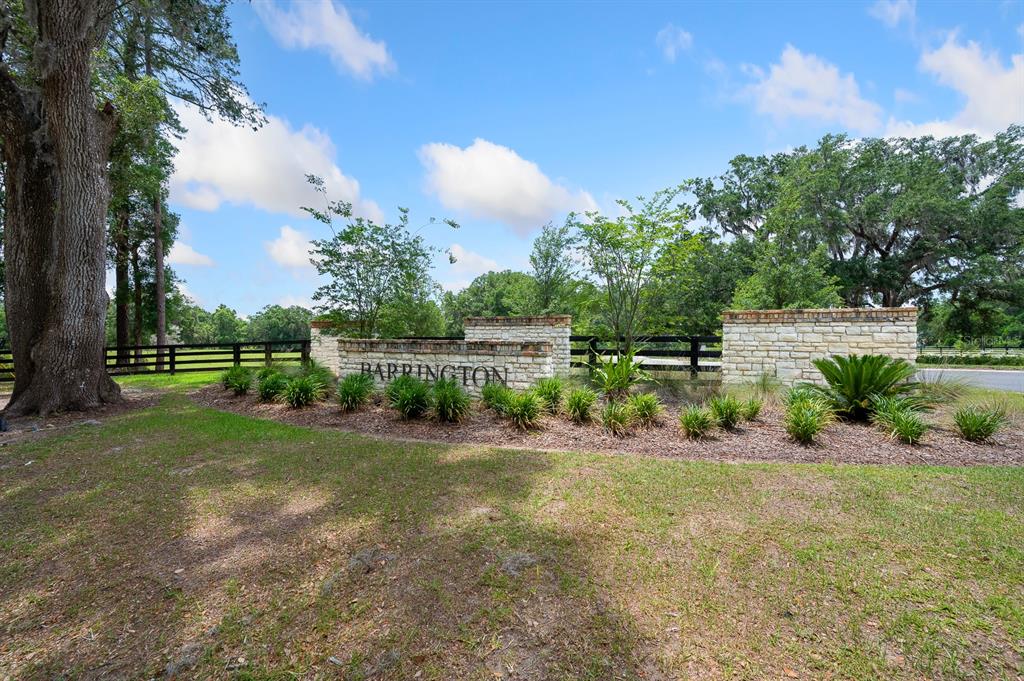 241 241st Newberry, FL 32669 - Photo 2 of 30 a view of a garden with a fountain