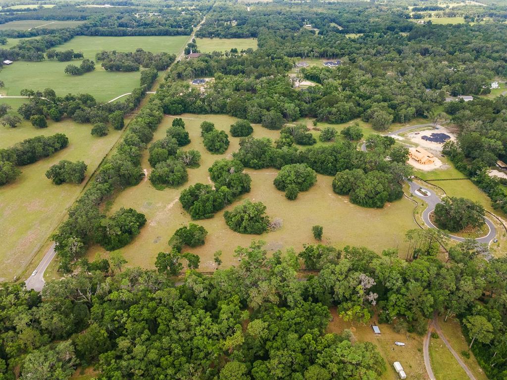 241 241st Newberry, FL 32669 - Photo 6 of 30 an aerial view of residential houses with outdoor space and trees
