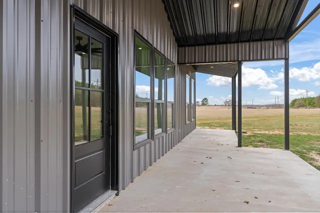 a view of a house with a porch