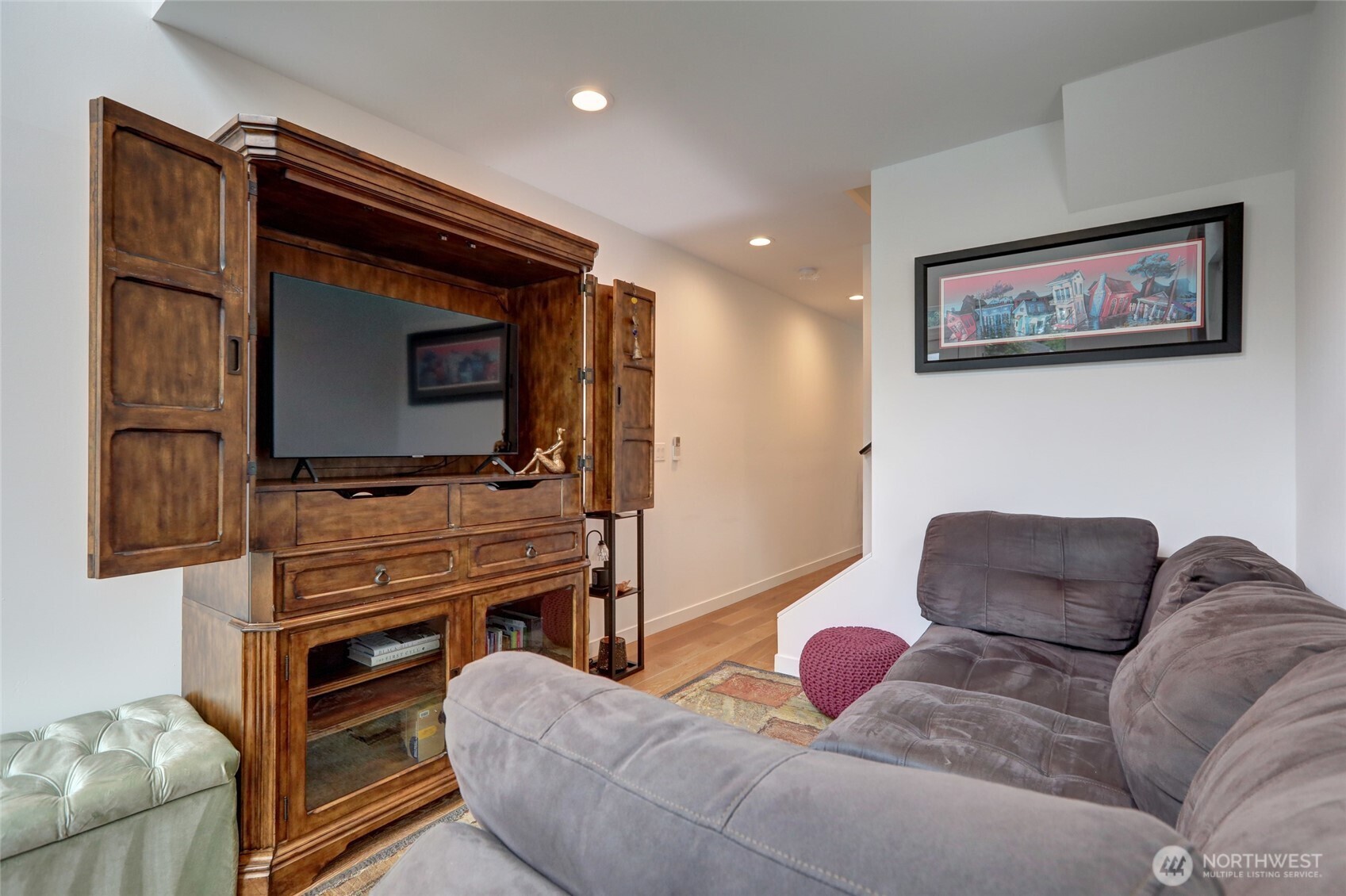 3854 22nd Avenue Southwest Seattle, WA 98106 - Photo 3 of 11 a living room with furniture and a flat screen tv