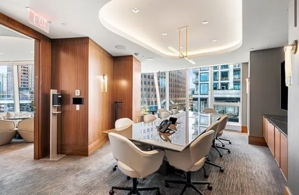 a dining room with furniture window wooden floor
