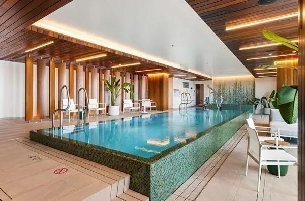 a view of swimming pool with outdoor seating