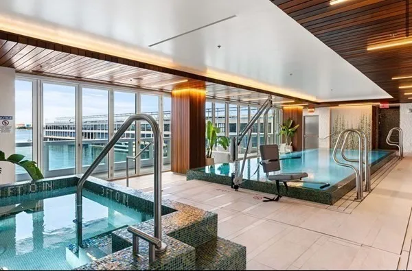 a view of a patio with table and chairs