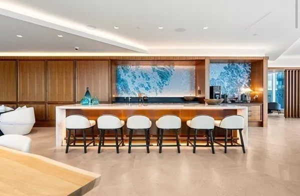 a view of a a dining room with furniture window and outside view