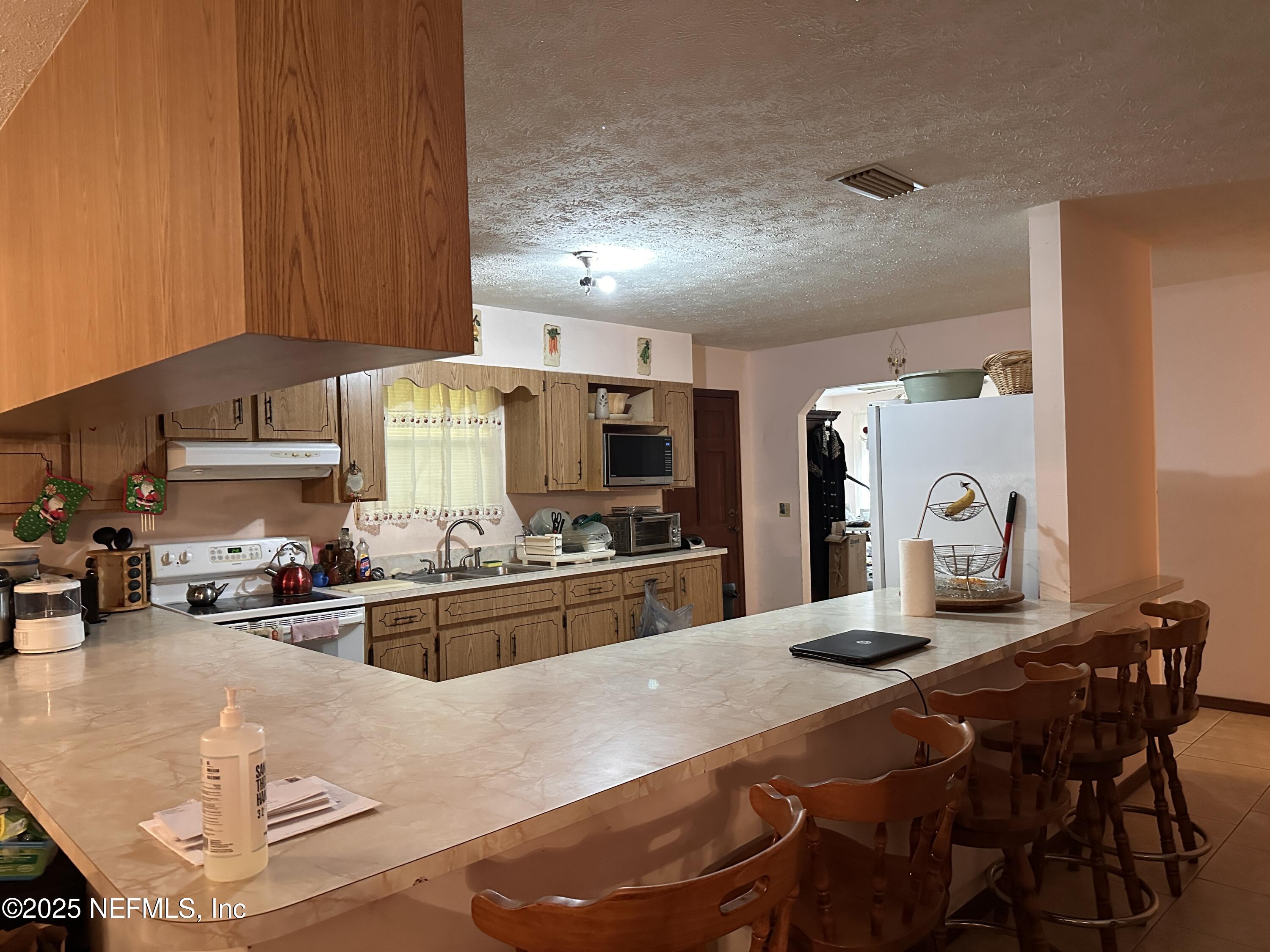 9181 Ribault Avenue Jacksonville, FL 32208 - Photo 3 of 25 Kitchen