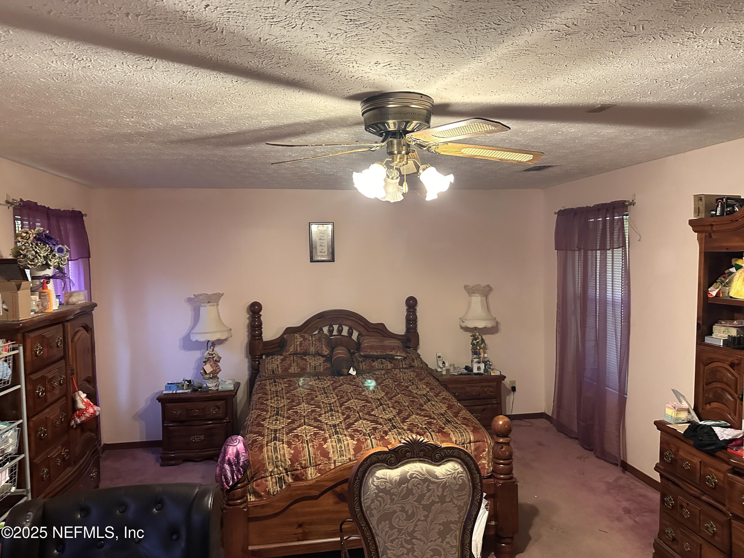 9181 Ribault Avenue Jacksonville, FL 32208 - Photo 9 of 25 Primary Bedroom