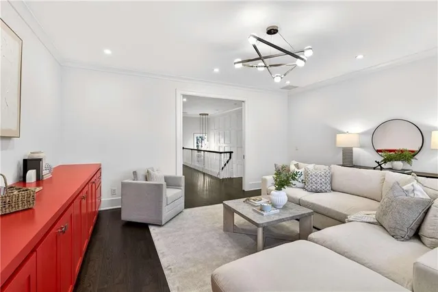 a bathroom with a granite countertop sink a toilet and bathtub