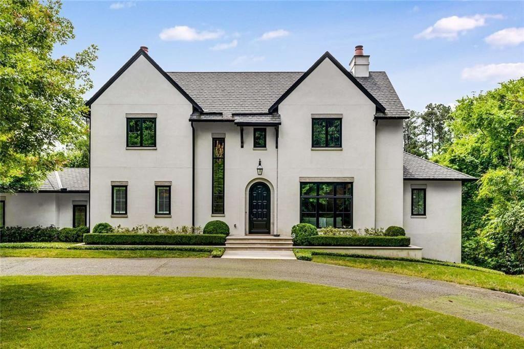3773 Randall Road Southeast Atlanta, GA 30339 - Photo 2 of 64 a front view of a house with swimming pool and glass windows