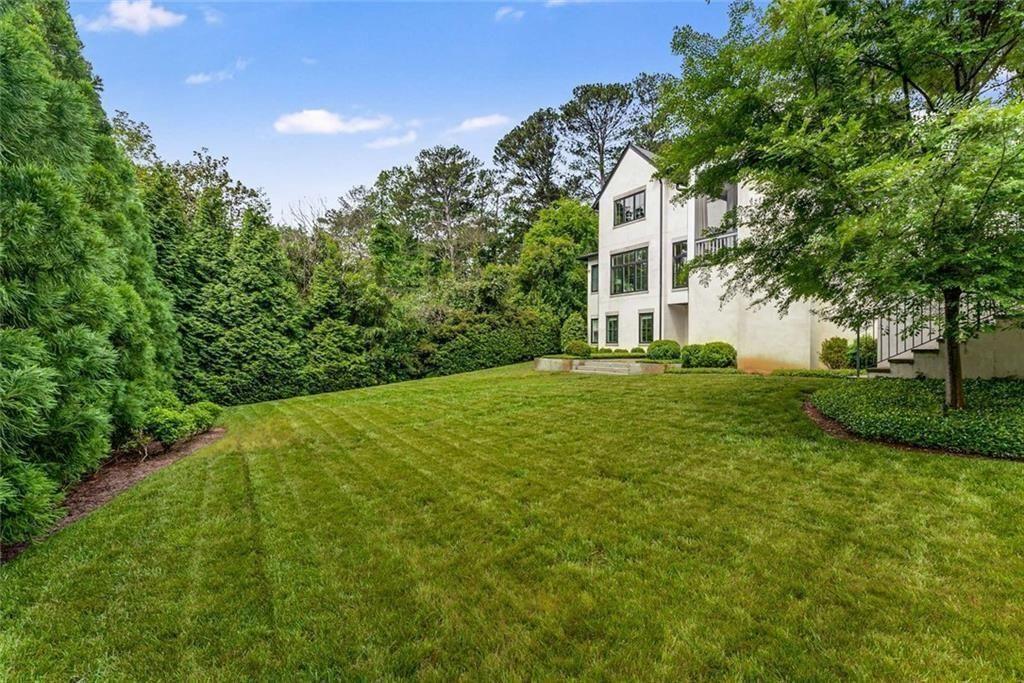 3773 Randall Road Southeast Atlanta, GA 30339 - Photo 58 of 64 a front view of a house with yard and green space
