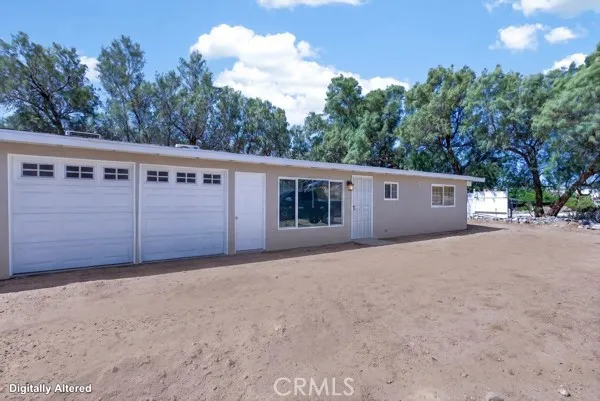 front view of a house with a garage