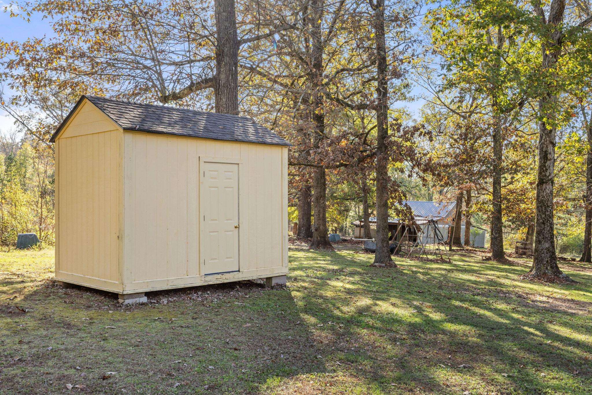213 Forrest School Road Corinth, MS 38834 - Photo 35 of 40 View of outbuilding with a lawn