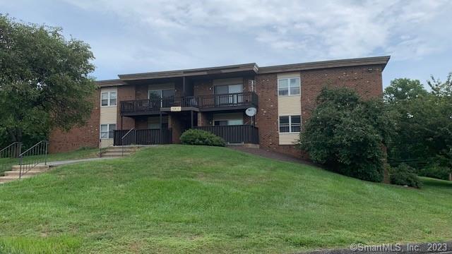92 Balance Rock Road, Unit 14 Seymour, CT 06483 - Photo 1 of 1 a house view with a garden space