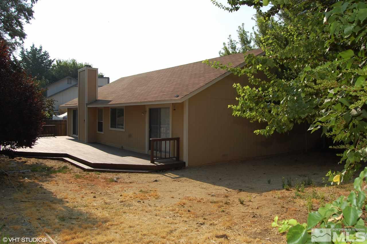 2415 Durango Court Reno, NV 89503 - Photo 25 of 25 a house with trees in front of it