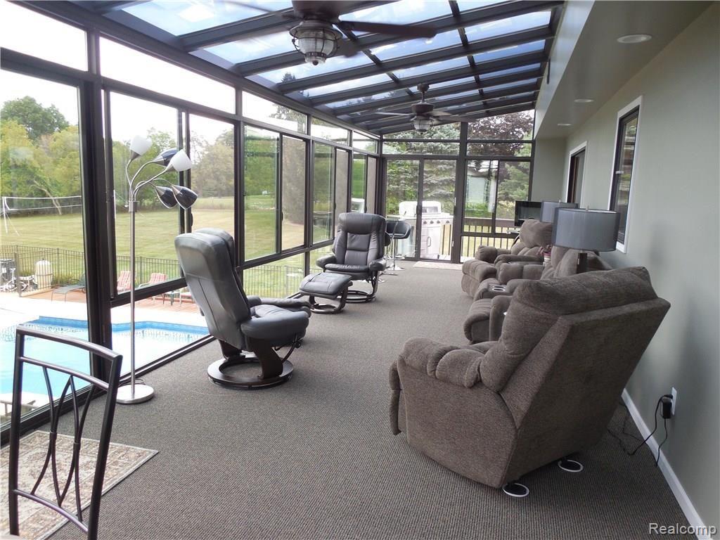 3955 Innisfree Road Howell, MI 48855 - Photo 11 of 43 New 4 season sun room as of 2015. What a great way to start every morning, having your morning cup of coffee in this amazing space year round.
