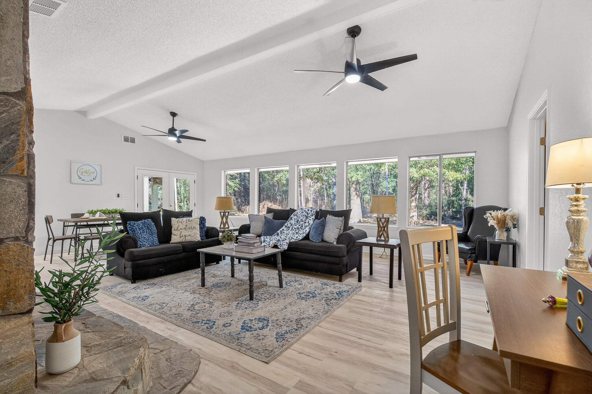4297 Edge Perry Road Crestview, FL 32539 - Photo 14 of 70 a living room with furniture large window and wooden floor
